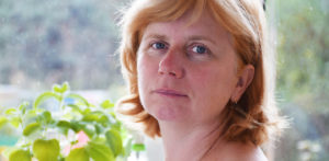 Woman at home with Pathway Homes
