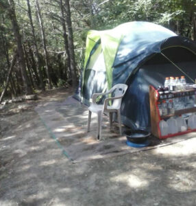 homeless person living in a tent