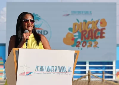 Sylisa addressing the crowd from the podium