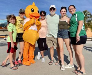 Duck Mascot and supporters
